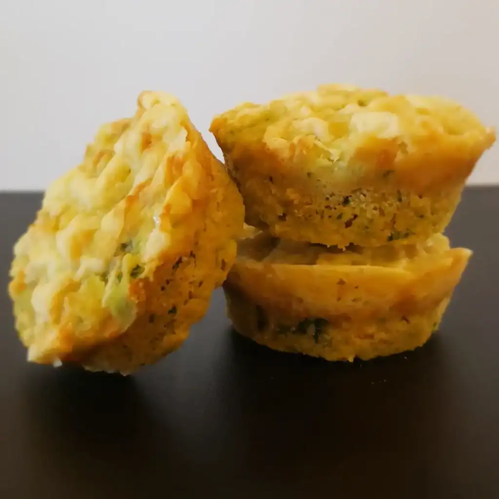 Healthy vegetable muffins for kids served on a white plate