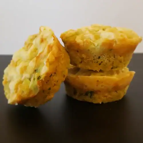 Healthy vegetable muffins for kids served on a white plate