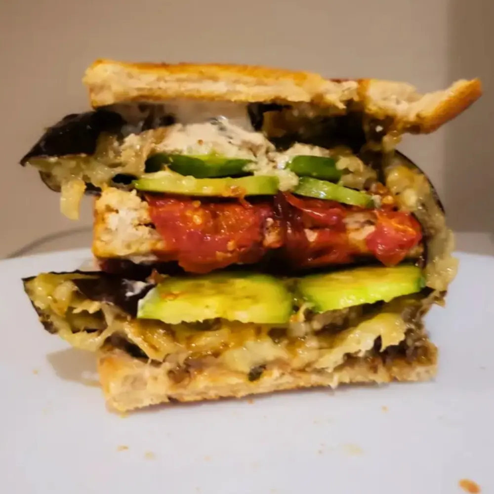 Grilled Eggplant Tahini Sandwich with roasted tomatoes